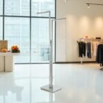 2 straight arms clothes rail - display stand for retail garment presentation.