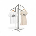 Chrome clothes rail display stand with 4 sloping arms, each with ball-stops – adjustable height garment display for retail.