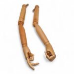 Articulated armed female tailors dummy with gold stand and wooden arms